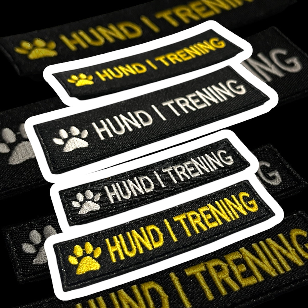 Borrelåsmerke Hund i trening – merke til hundesele