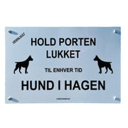 Skilt «Hold porten lukket – hund i hagen»