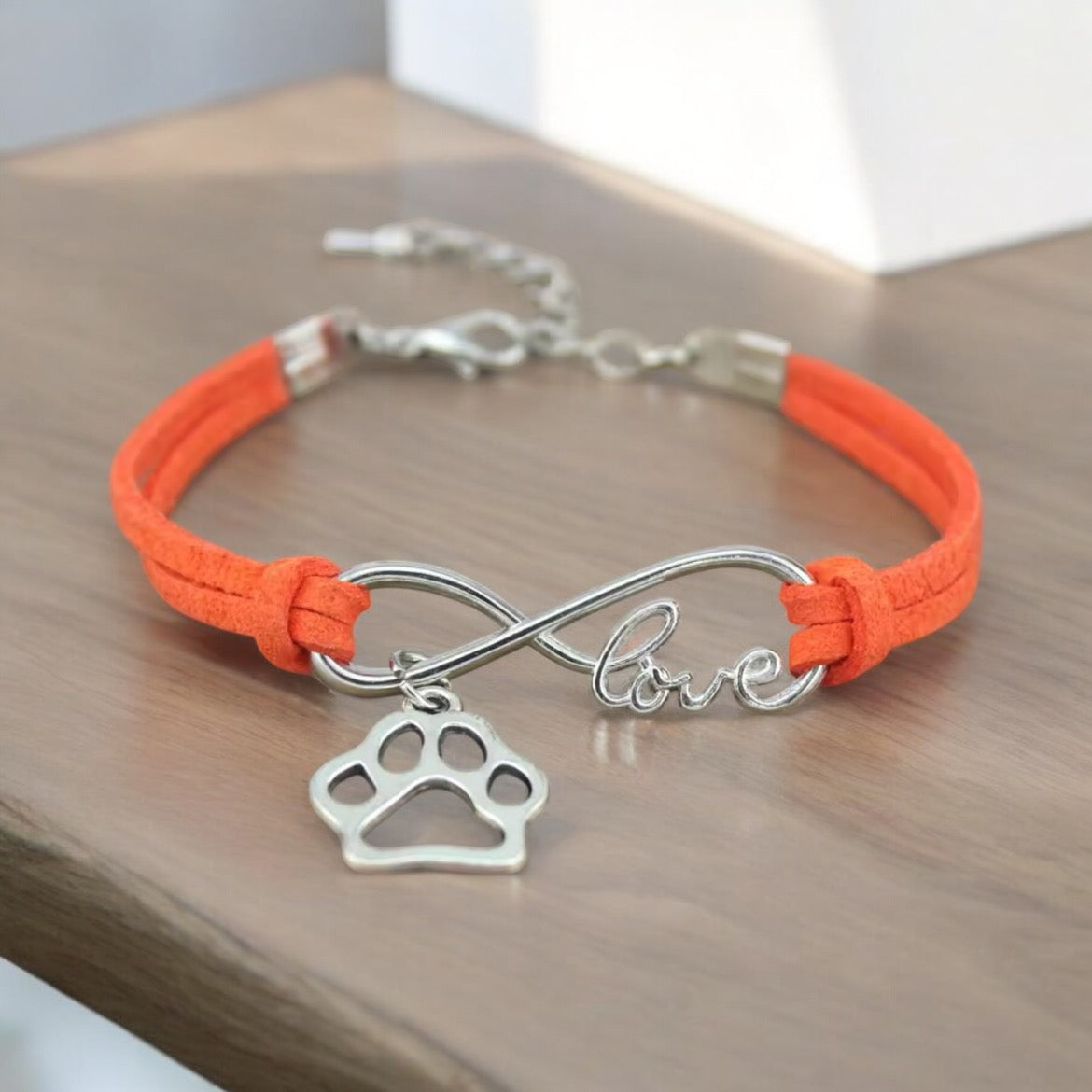 Armbånd med poteanheng infinity