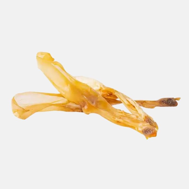 Produktbilde av kaninører uten pels utenfor forpakning, liggende i en haug, fra Radical Dog.