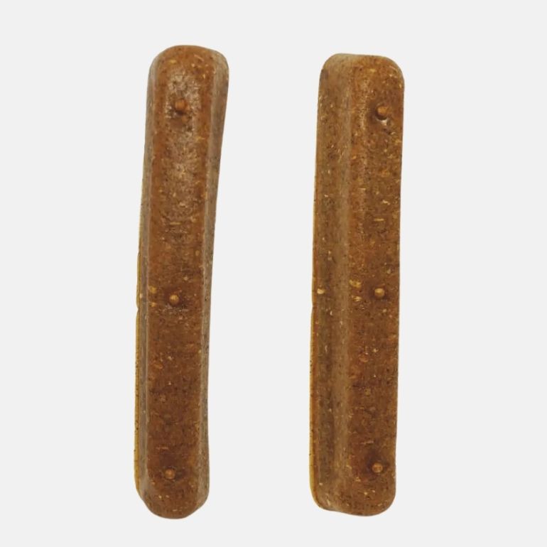 Produktbilde av ostesticks utenfor forpakning, liggende i en haug, fra Radical Dog.