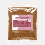 Pose biffkrydder av malt storfevom fra Radical Dog på grå bakgrunn