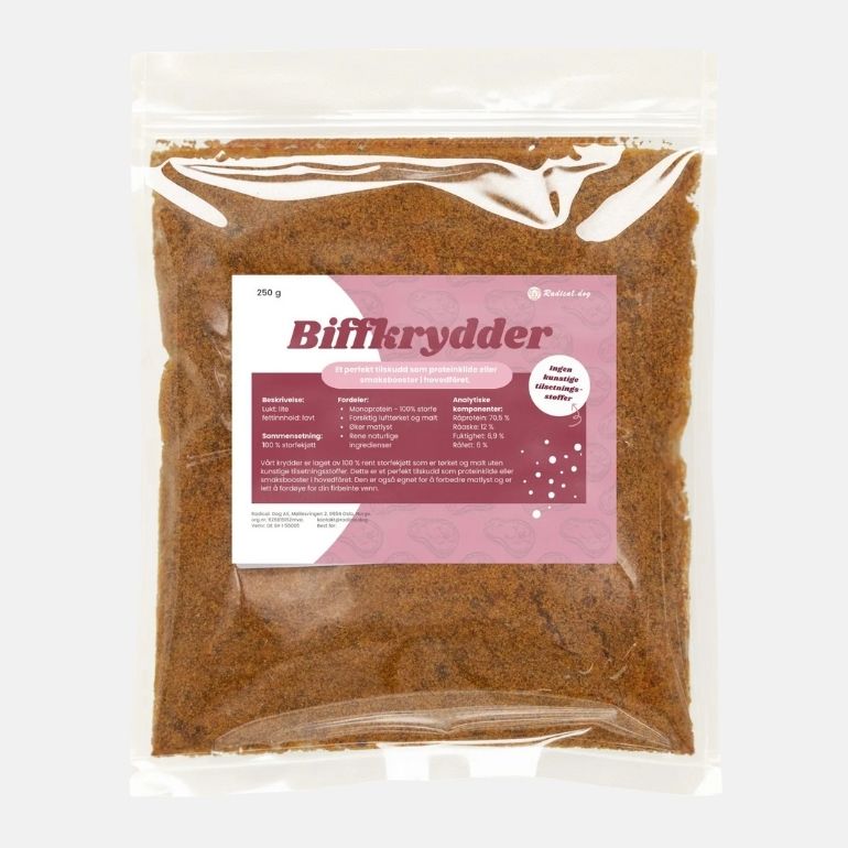 Pose biffkrydder av malt storfevom fra Radical Dog på grå bakgrunn