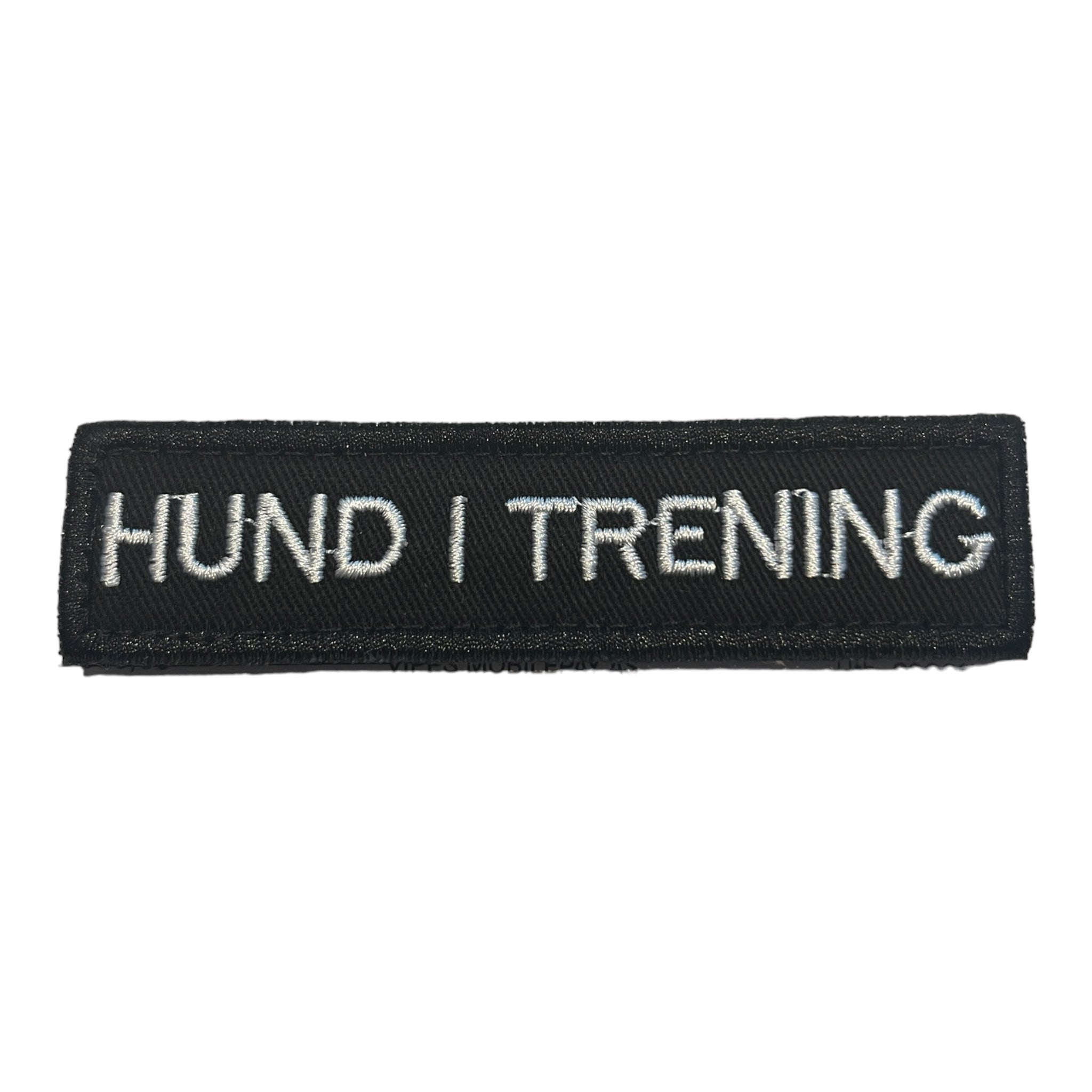 Borrelåsmerke Hund i trening – merke til hundesele